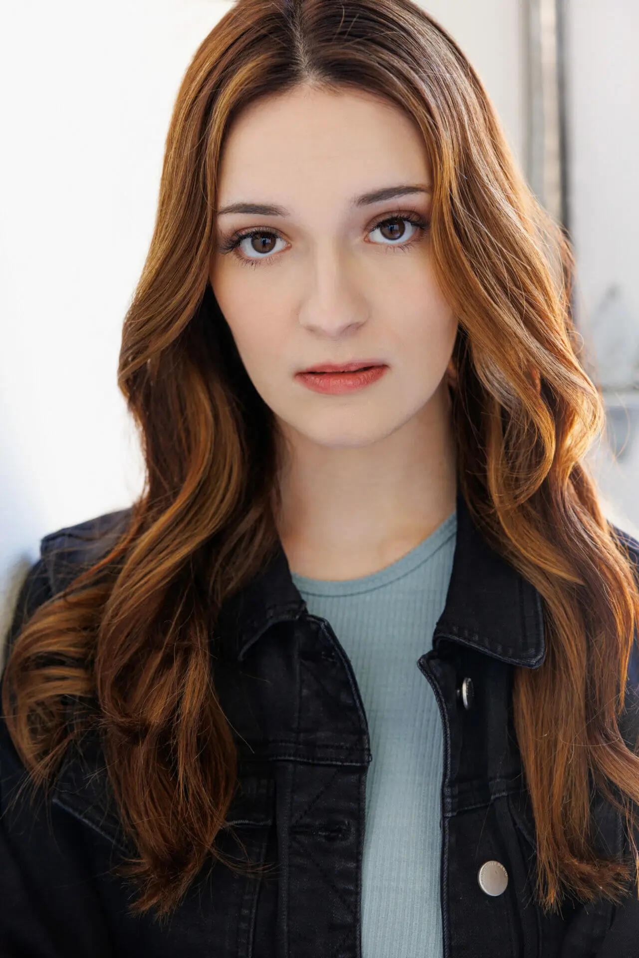 headshot of red headed actress