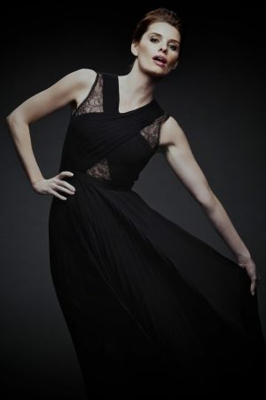 Monochromatic Fashion Brigitte Robertson posing in a black dress in Mckinney TX.